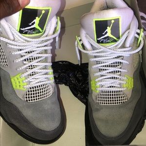 Jordan 4’s. Lime green and grey.